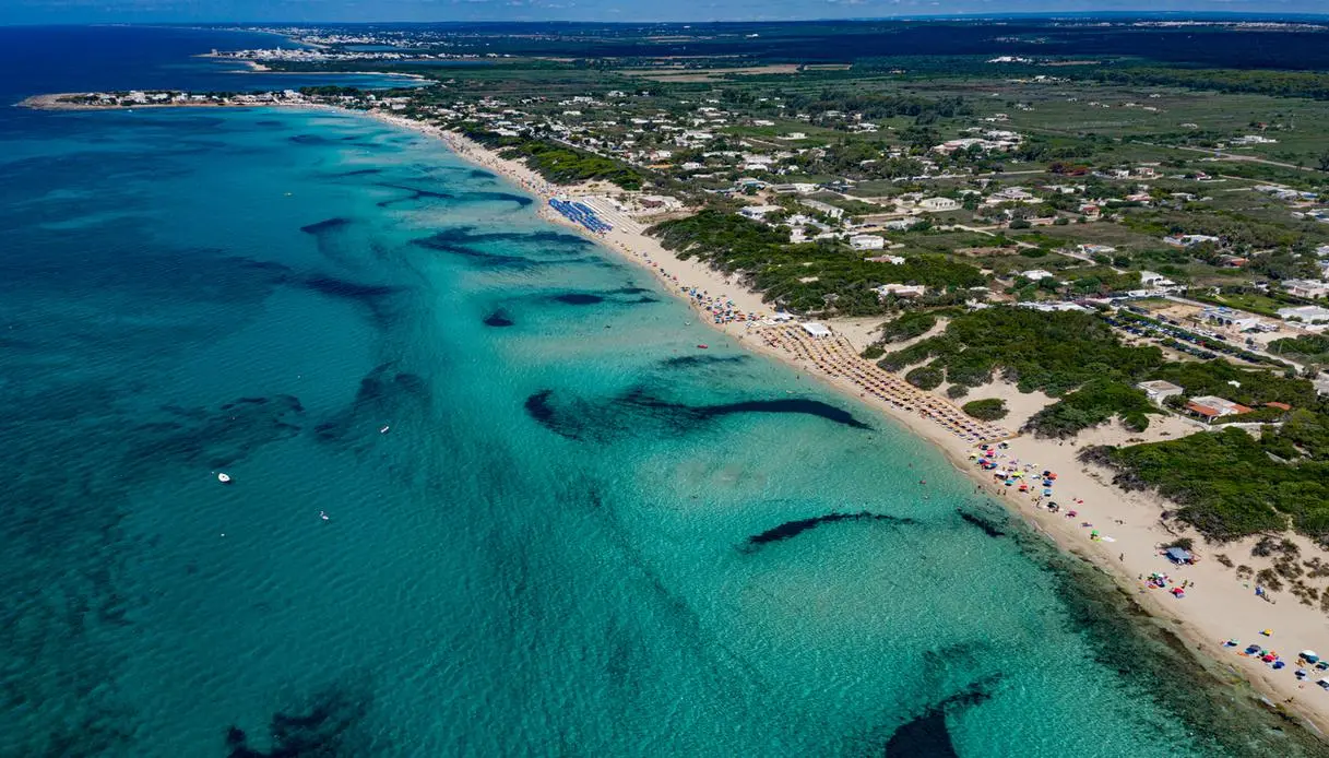 Aerial view of the turquoise water at Punta Prosciutto